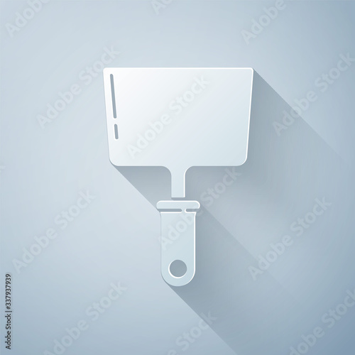 Paper cut Putty knife icon isolated on grey background. Spatula repair tool. Spackling or paint instruments. Paper art style. Vector Illustration