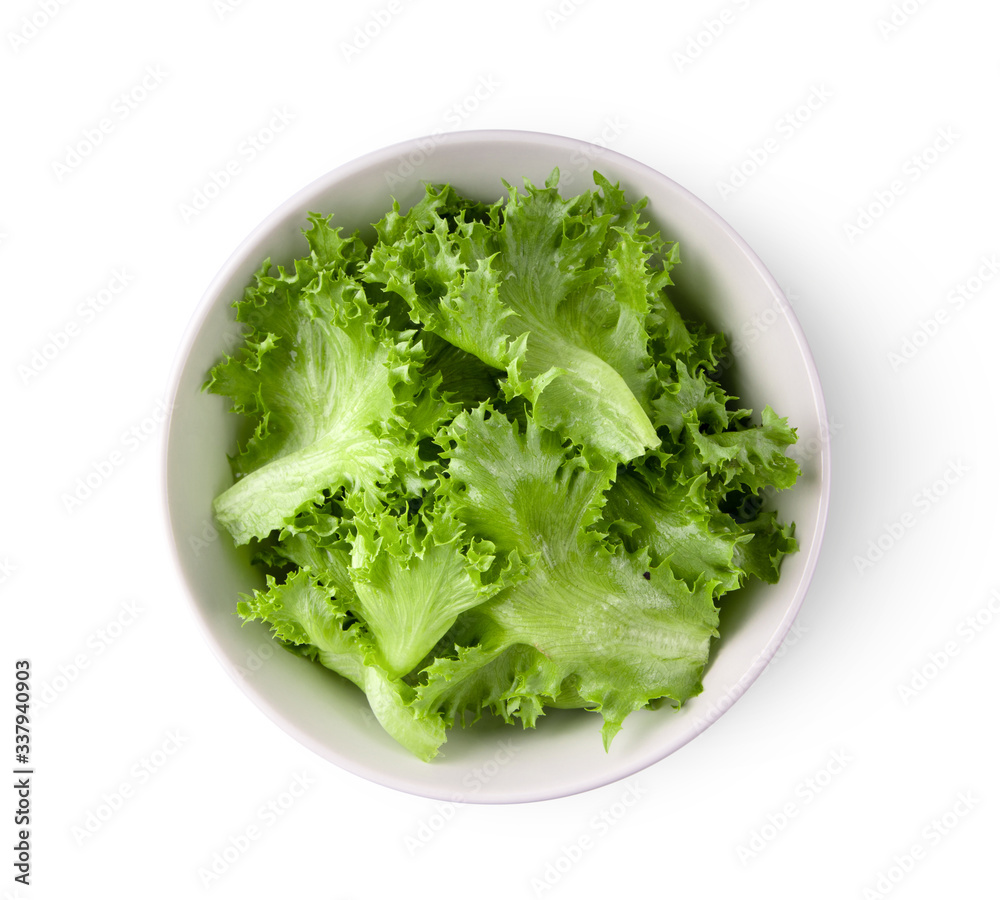green frillies iceberg lettuce in white bowl on white background. top view green frillies iceberg lettuce in white bowl on white background. top view
