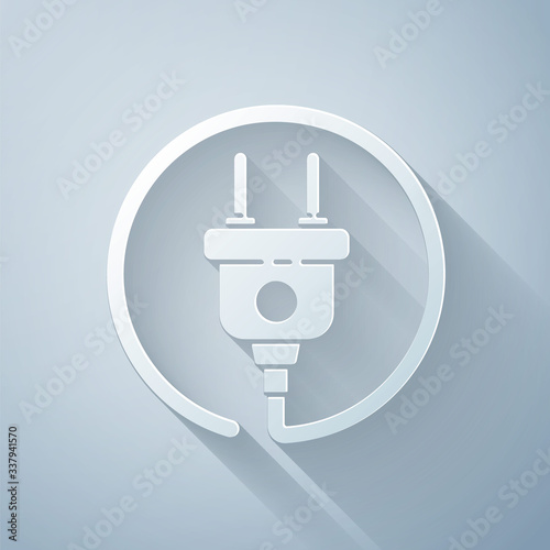 Paper cut Electric plug icon isolated on grey background. Concept of connection and disconnection of the electricity. Paper art style. Vector Illustration