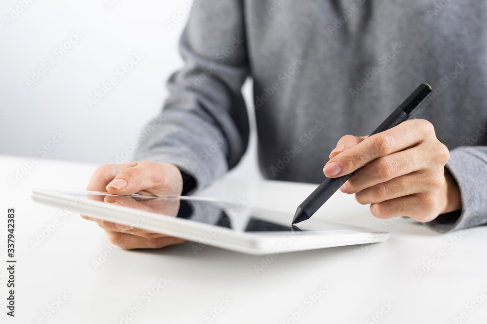 Woman using digital tablet computer Woman using digital tablet computer