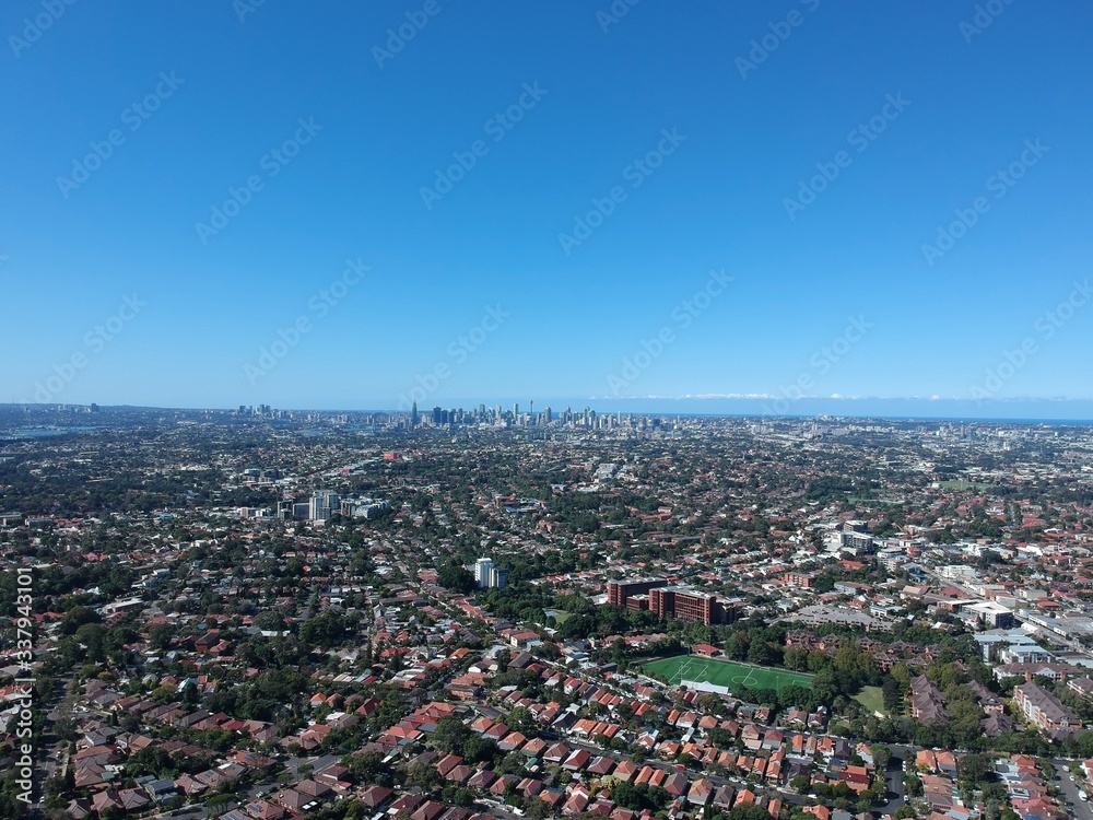 Drone panoramic aerial view of Sydney NSW Australia city Skyline and looking down on all suburbs 