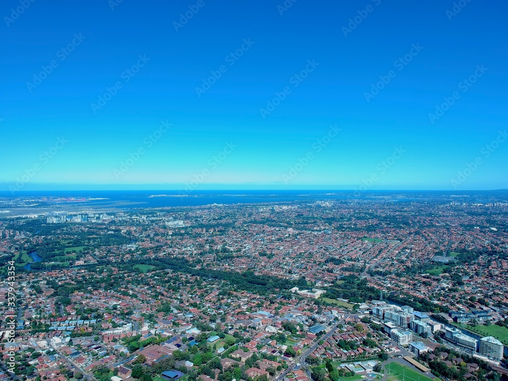 Drone panorama aerial drone view of Sydney NSW Australia city Skyline and looking down on all suburbs with roof tops of Sydney inner western suburbs 