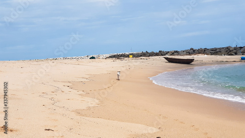 A lonely boat on the beach.