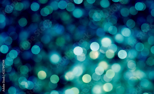 Abstract bokeh pastel background. Bokeh light, shimmering blur spot lights on multicolored abstract background