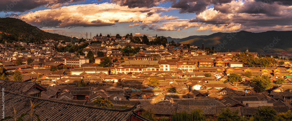 Obraz premium Panorama Top view scene of ancient LiJiang old town, is the historical center of Lijiang City, in Yunnan, China. It is a UNESCO World, culture and traditional, travel and tourist, holiday concept