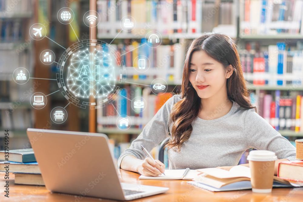 Polygonal brain shape of an artificial intelligence with various icon of smart city Internet of Things Technology over Asian young Student using technology laptop in library of university