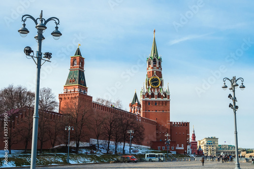 View of the walls and towers of the Moscow Kremlin with a clock on Red Square
