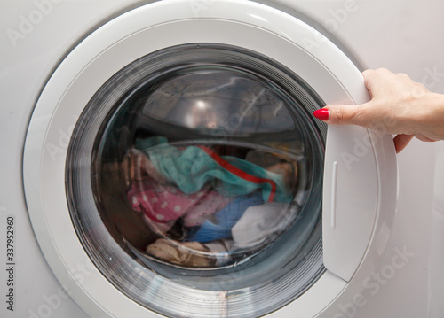 linen is loaded in the washing machine © Radnatt