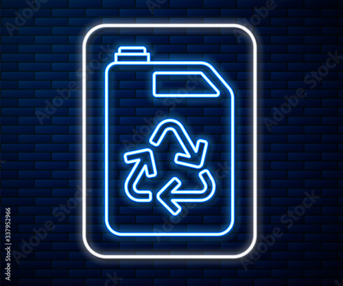 Glowing neon line Eco fuel canister icon isolated on brick wall background. Eco bio and barrel. Green environment and recycle. Vector Illustration