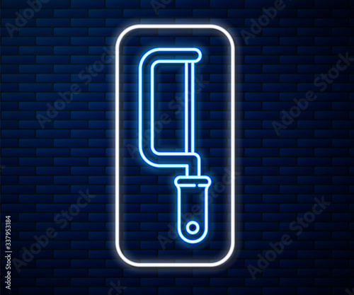 Glowing neon line Hacksaw icon isolated on brick wall background. Metal saw for wood and metal. Vector Illustration