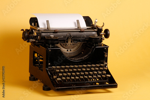 Mechanical portable typewriter made in 1952. 1952 portable typewriter made of metal and lead material.