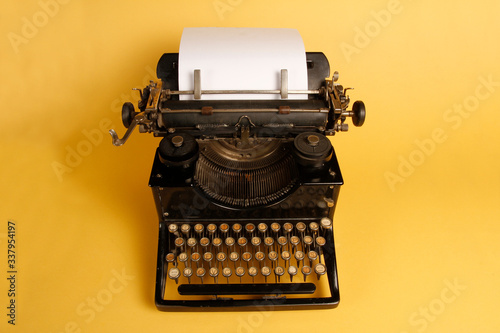 Mechanical portable typewriter made in 1952. 1952 portable typewriter made of metal and lead material.