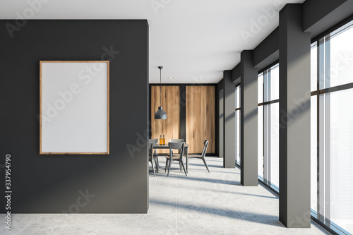 Gray and wooden dining room with poster © ImageFlow