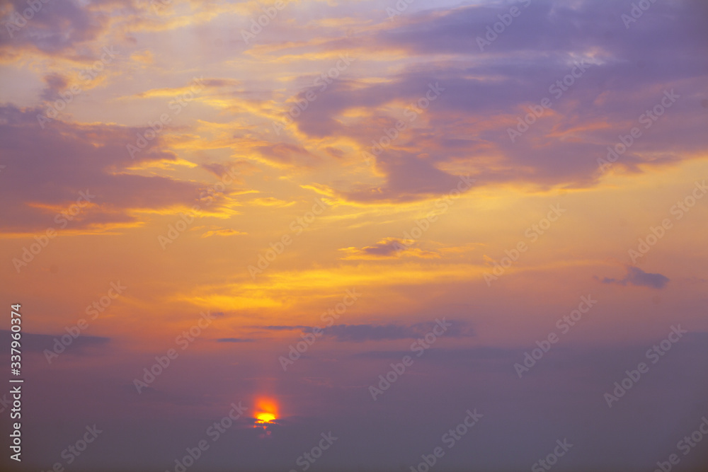 Fototapeta premium beautiful red-orange sunset on the sea, colorful sky and sea, magical landscape