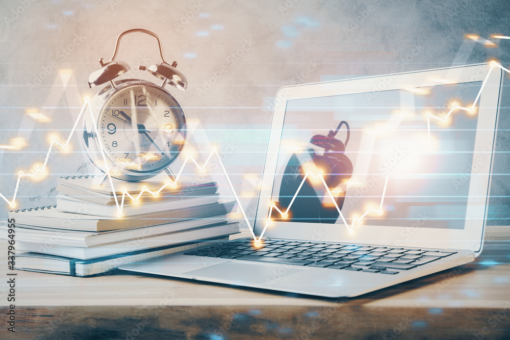 Forex market graph hologram and personal computer on background. Multi exposure. Concept of investment. Forex market graph hologram and personal computer on background. Multi exposure. Concept of investment.