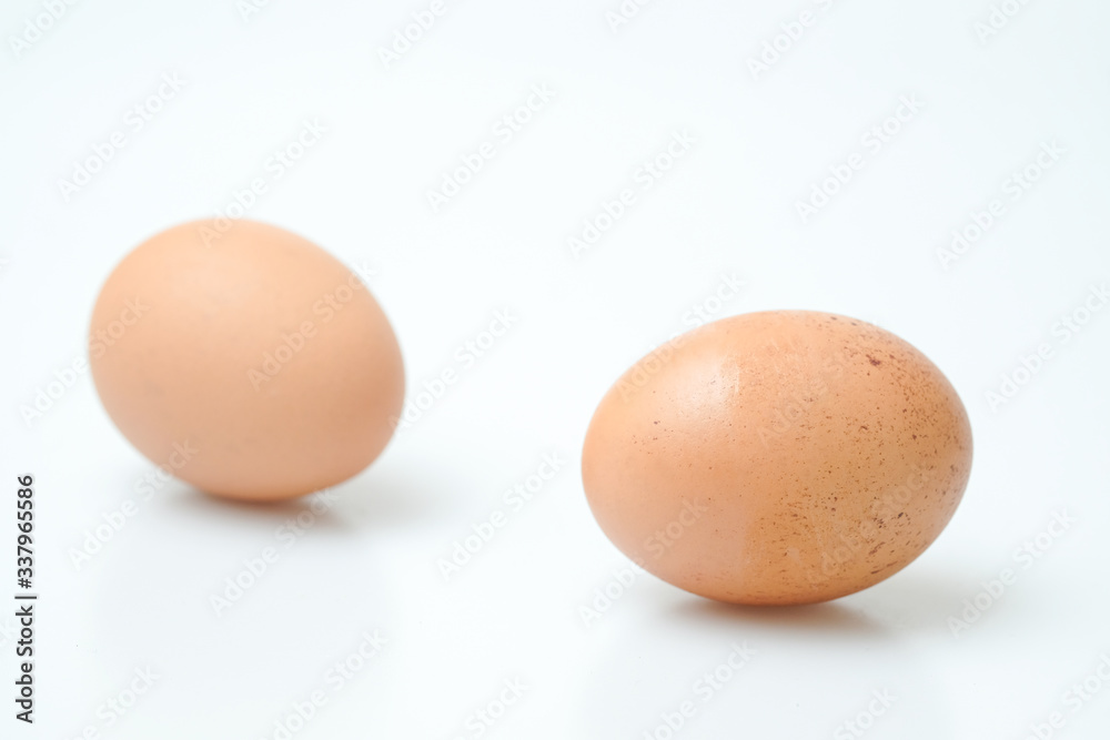 Brown chicken egges on white background. Brown chicken egges on white background.