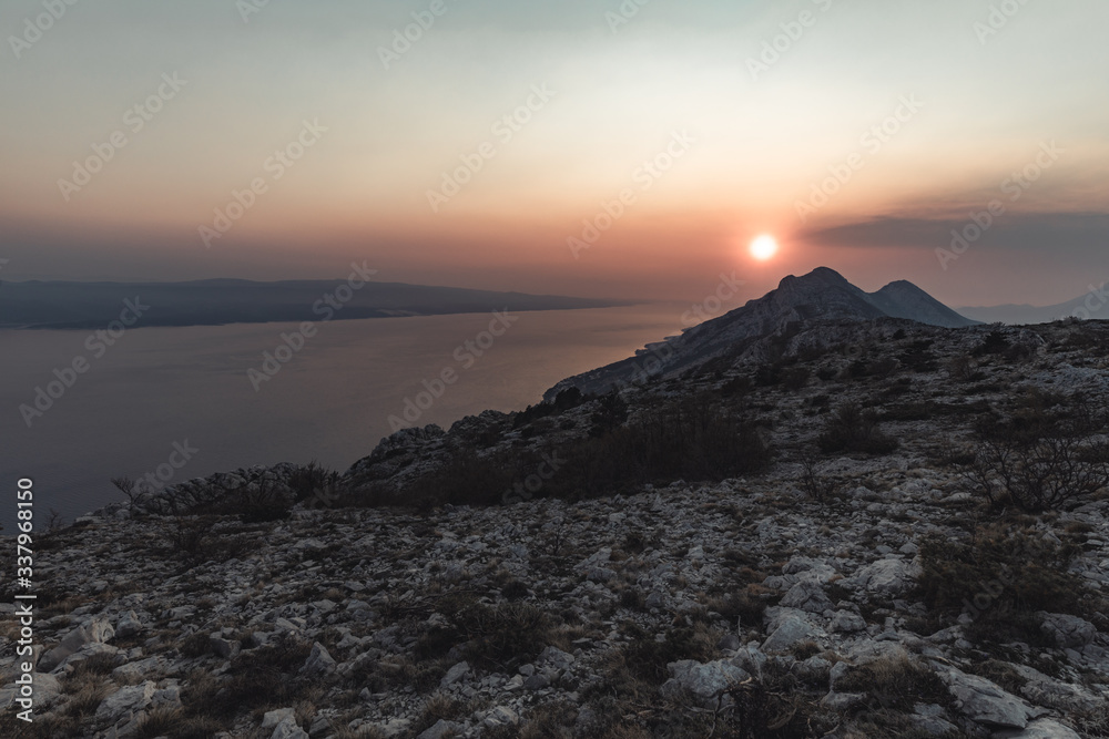 Beautiful sunset colors over the mountains, Central Dalmatia, Croatia Beautiful sunset colors over the mountains, Central Dalmatia, Croatia