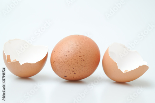 Broken egg shell on white background