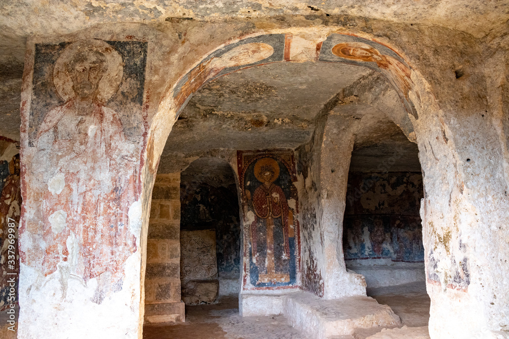 The frescoes of the rock church of Santa Margherita and cave dwellings in Mottola, Taranto, Apulia (Puglia), Italy
