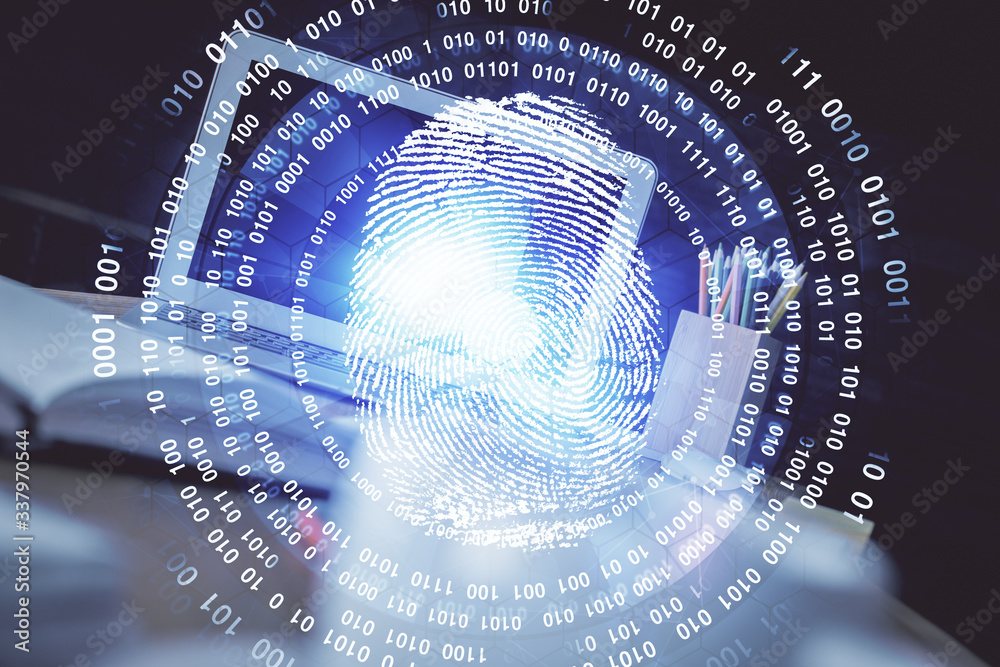 Computer on desktop in office with finger print drawing. Double exposure. Concept of business data security. Computer on desktop in office with finger print drawing. Double exposure. Concept of business data security.