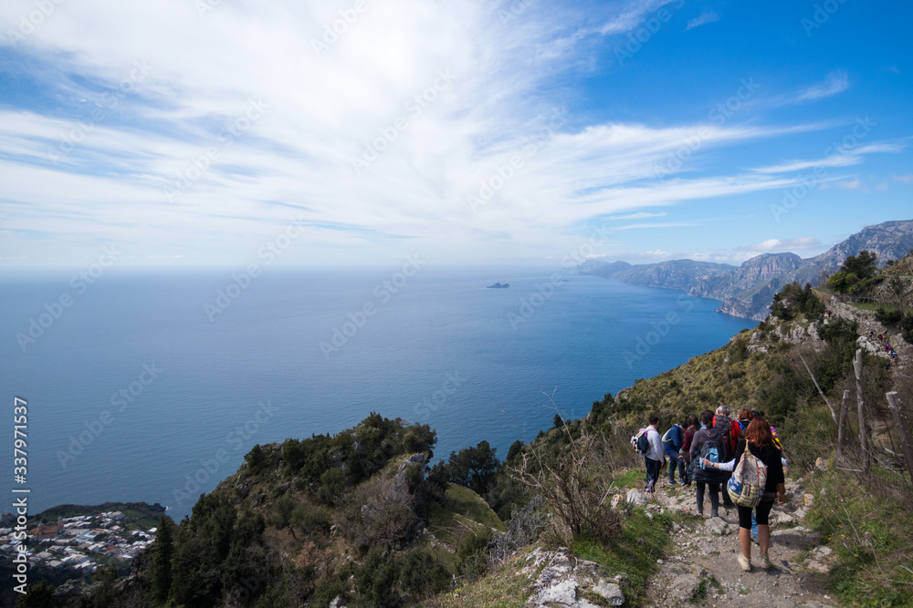 Positano, Campania, Italy - march 2 2017: Hikers walk on a Beautiful path of Amalfi coast called the Path of the Gods (Sentiero degli Dei) Trekking route from Agerola to Nocelle.