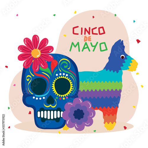 Mexican pinata and skull with flowers design