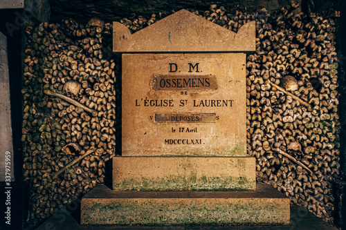 underground catacombs full of bones, gravestones and inscriptions
