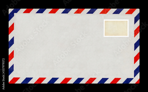 Vintage postage envelope on a black background, message, air mail