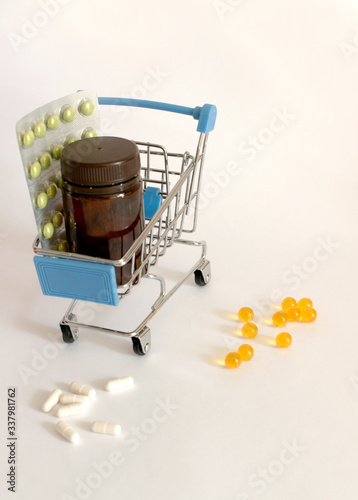 pills in a basket on a white background
