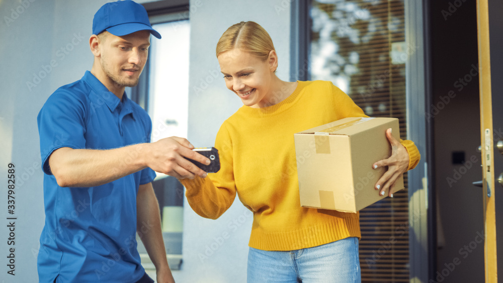 Beautiful Young Woman Meets Delivery Man who Gives Her Cardboard Box Package, She Signs Electronic Signature POD Device. Courier Delivering Parcel in the Suburban Neighborhood. Beautiful Young Woman Meets Delivery Man who Gives Her Cardboard Box Package, She Signs Electronic Signature POD Device. Courier Delivering Parcel in the Suburban Neighborhood.