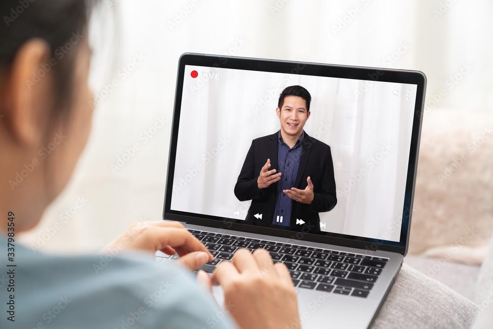 Young asian chinese leader or businessman on management forum, teleconference, town hall or press video conference online with work remotely at home during coronavirus and business continuity concept. Young asian chinese leader or businessman on management forum, teleconference, town hall or press video conference online with work remotely at home during coronavirus and business continuity concept.