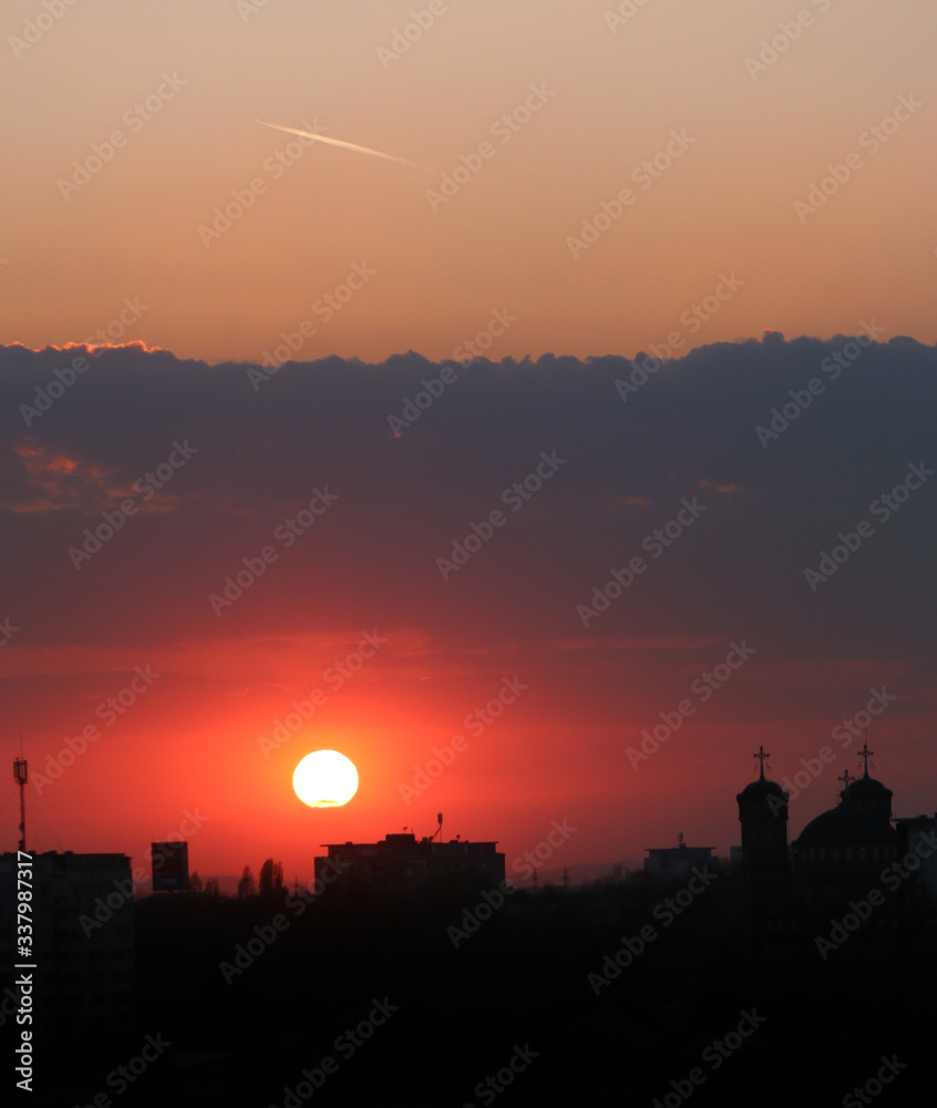 Beautiful sunset above the city skyline  , The city of Ploiesti, Romania with a beautiful sun