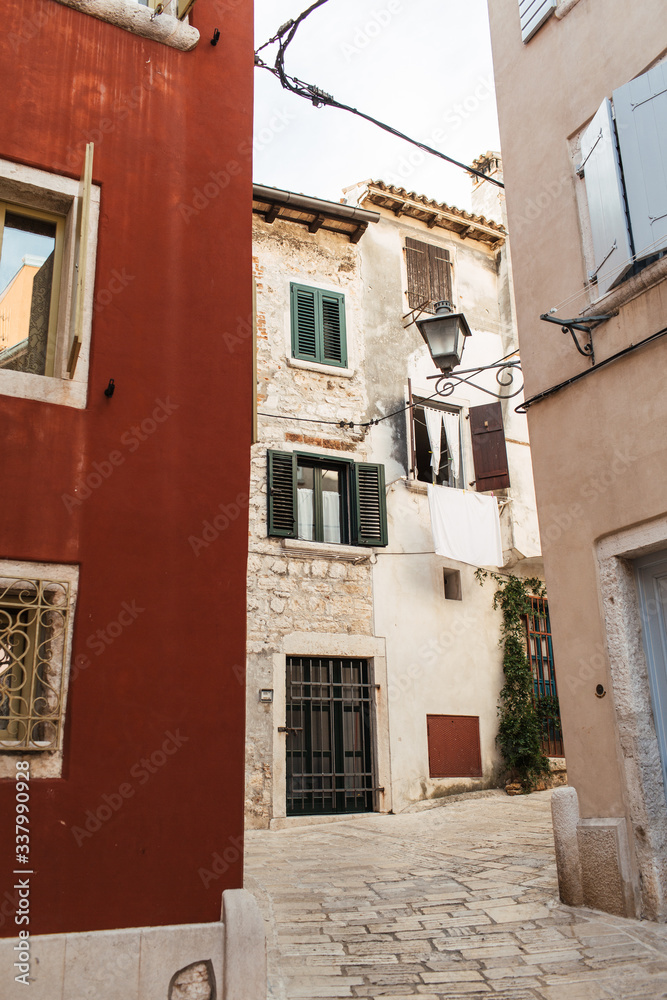 2019, Europe, Croatia, Rovinj. Architecture of old town, colorful buildings with old wood shutters. Travel, adventure concept. City background.