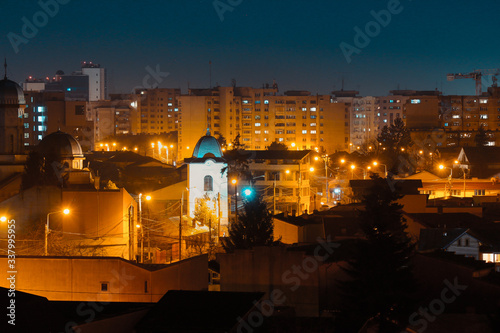 Old city buildings in the dusk , The city of Ploiesti , Romania in the golden light