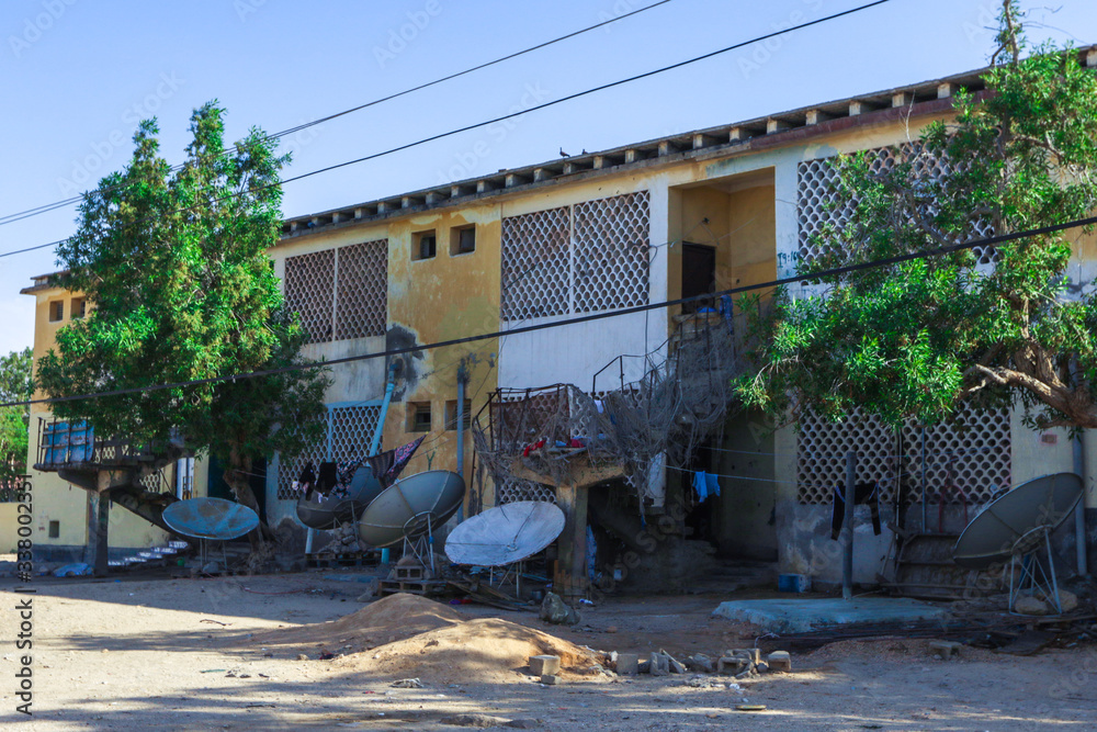 Berbera, Somaliland - November 10, 2019: Looks like Crushed Streets and Buildings in the Berbera City Berbera, Somaliland - November 10, 2019: Looks like Crushed Streets and Buildings in the Berbera City