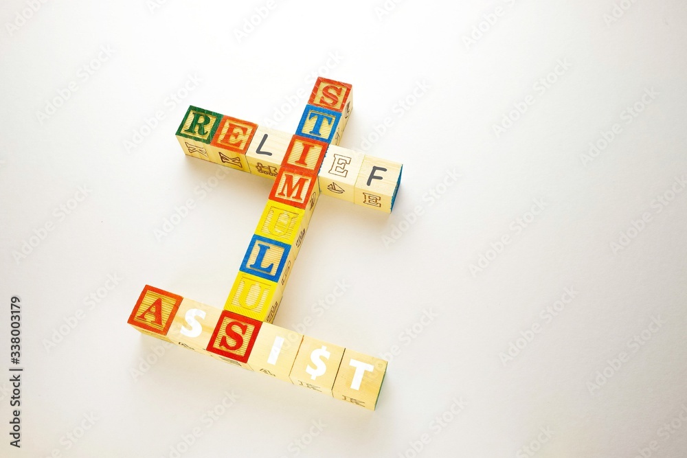 onceptual government economic stimulus packages in financial relief and assistance during crisis or Covid-19. Top view wooden letter block. Selective focus on texts. onceptual government economic stimulus packages in financial relief and assistance during crisis or Covid-19. Top view wooden letter block. Selective focus on texts.
