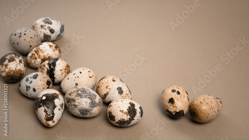 Easter background. Abstraction of eggs on a beige background.