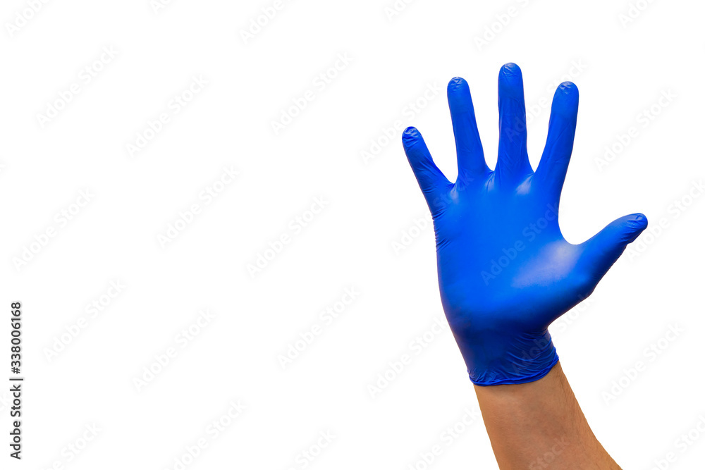 Closeup of a male hand in a blue medical glove showing a hello on a white background.