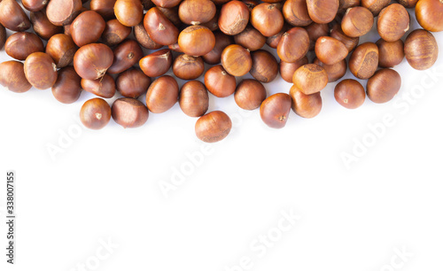 Closeup horse chestnuts isolated on white background, healthy food concept