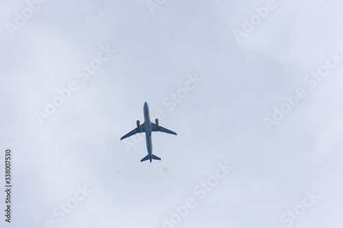 airplane flying over the blue sky