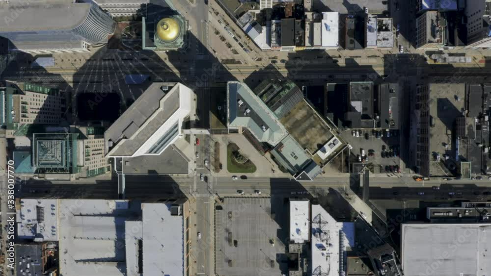 Downtown Buffalo, New York buildings, skyway, midday, sunny, aerial. This is one clip of many in this series - each of which shows slightly different contents (buildings / cars / highway) of the city. Downtown Buffalo, New York buildings, skyway, midday, sunny, aerial. This is one clip of many in this series - each of which shows slightly different contents (buildings / cars / highway) of the city.