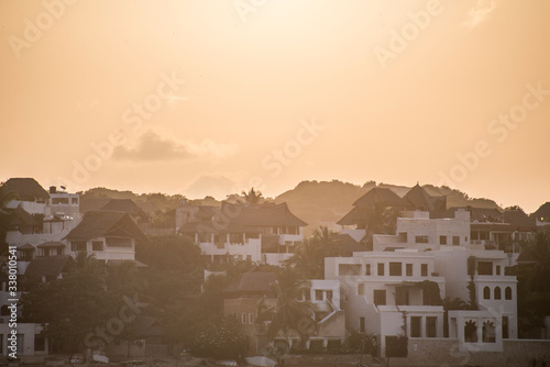 Incredible golden hour light on Shela village, Lamu island, Kenya, Africa