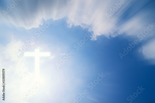 Conceptual wood cross or religion symbol shape over a sky with clouds background for God. belief on resurrection of god and worship christian. sky freedom.