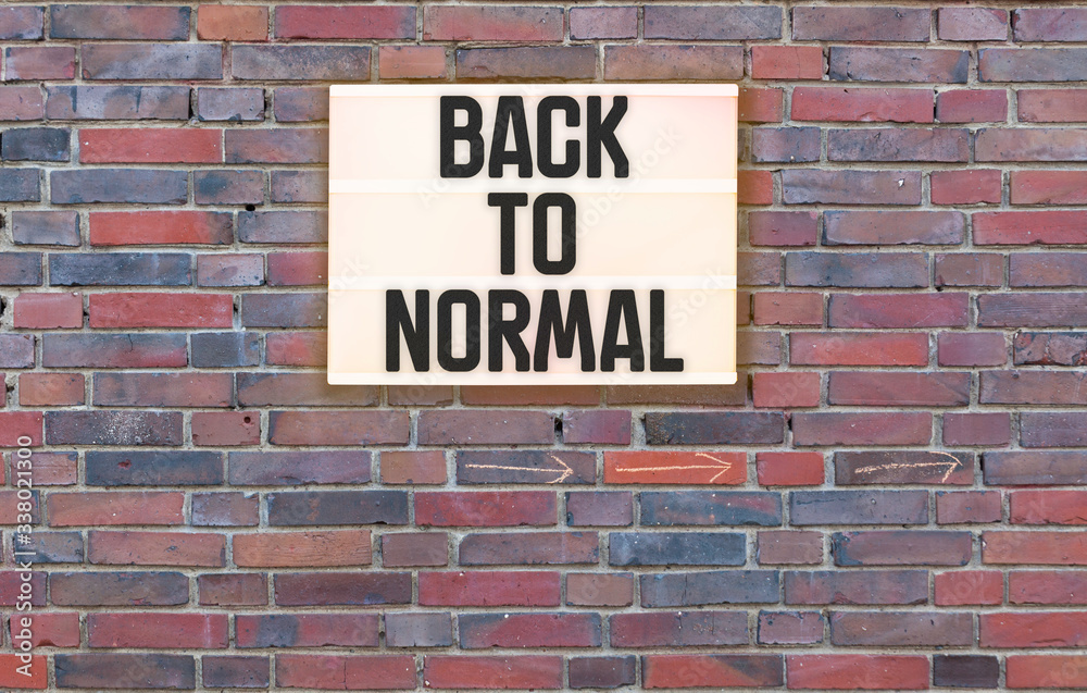 Back to Normal words in light box letters, corona virus pandemic buzwword headline Back to Normal words in light box letters, corona virus pandemic buzwword headline