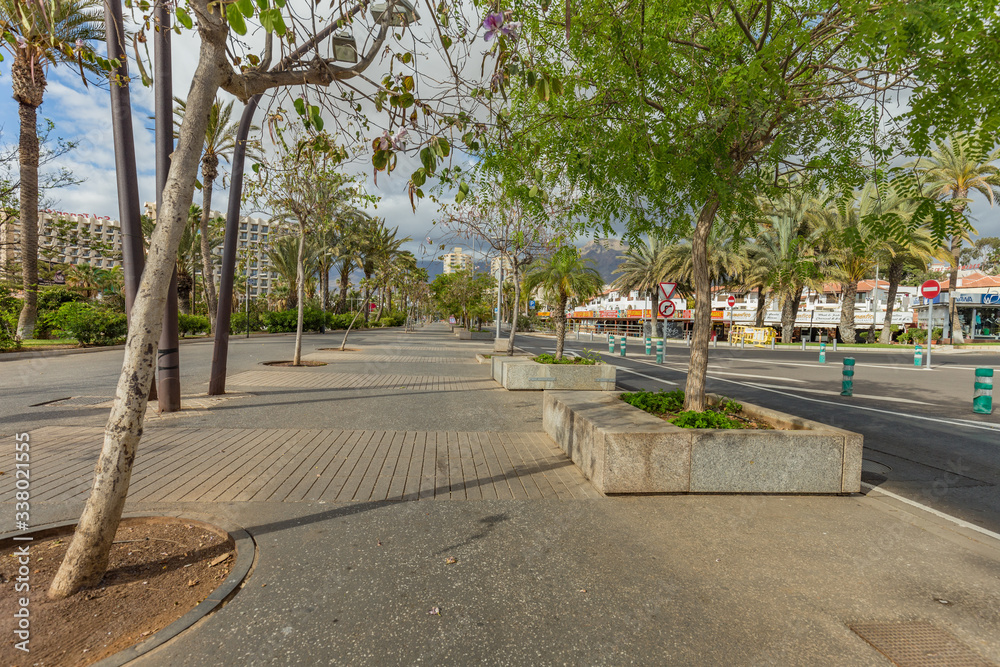 Las Americas,Tenerife, Spain March 21, 2020: Quiet, deserted streets of the most popular and crowded tourist resort in the Canary Islands. Isolation regimen during a coronavirus Covid-19 pandemic Las Americas,Tenerife, Spain March 21, 2020: Quiet, deserted streets of the most popular and crowded tourist resort in the Canary Islands. Isolation regimen during a coronavirus Covid-19 pandemic