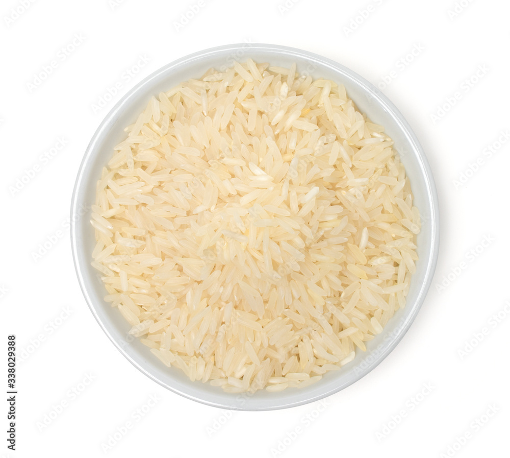 Milled rice(White rice) in the bowl isolated on white background,Healthy food,top view. Milled rice(White rice) in the bowl isolated on white background,Healthy food,top view.