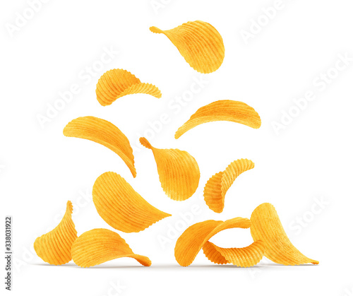 Grooved potato chips falling down. Rippled wavy snack food refreshment. Isolated on white background. 3d rendered illustration.