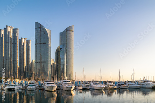 Skyscraper and yacht dock in Haeundae, Busan, Korea  © J. studio