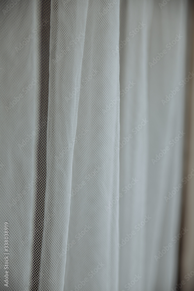 white fabric curtain tulle waves