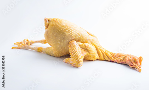 Fototapeta Naklejka Na Ścianę i Meble -  A fresh fat chicken on white background